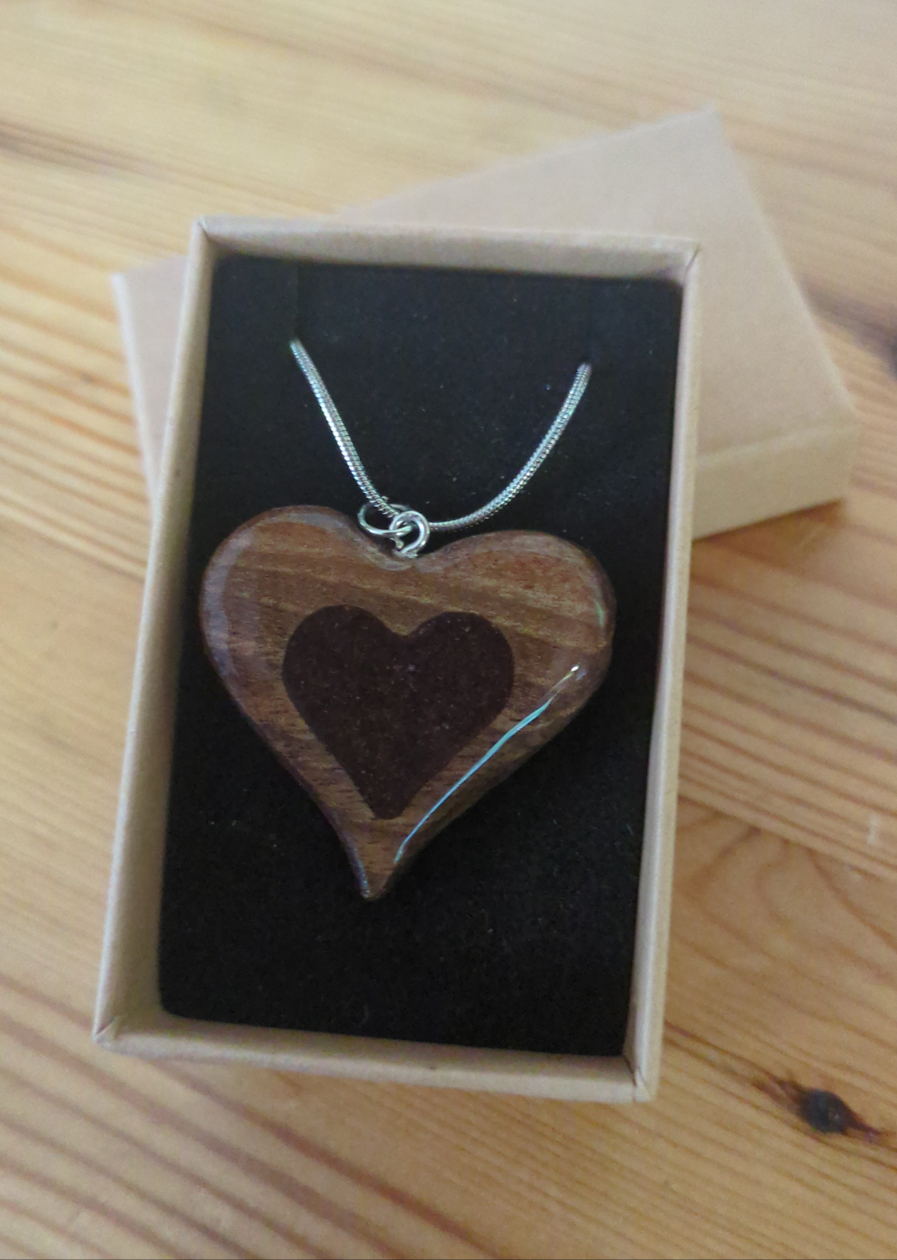 Heart-Shaped pendant with glitter black resin insert