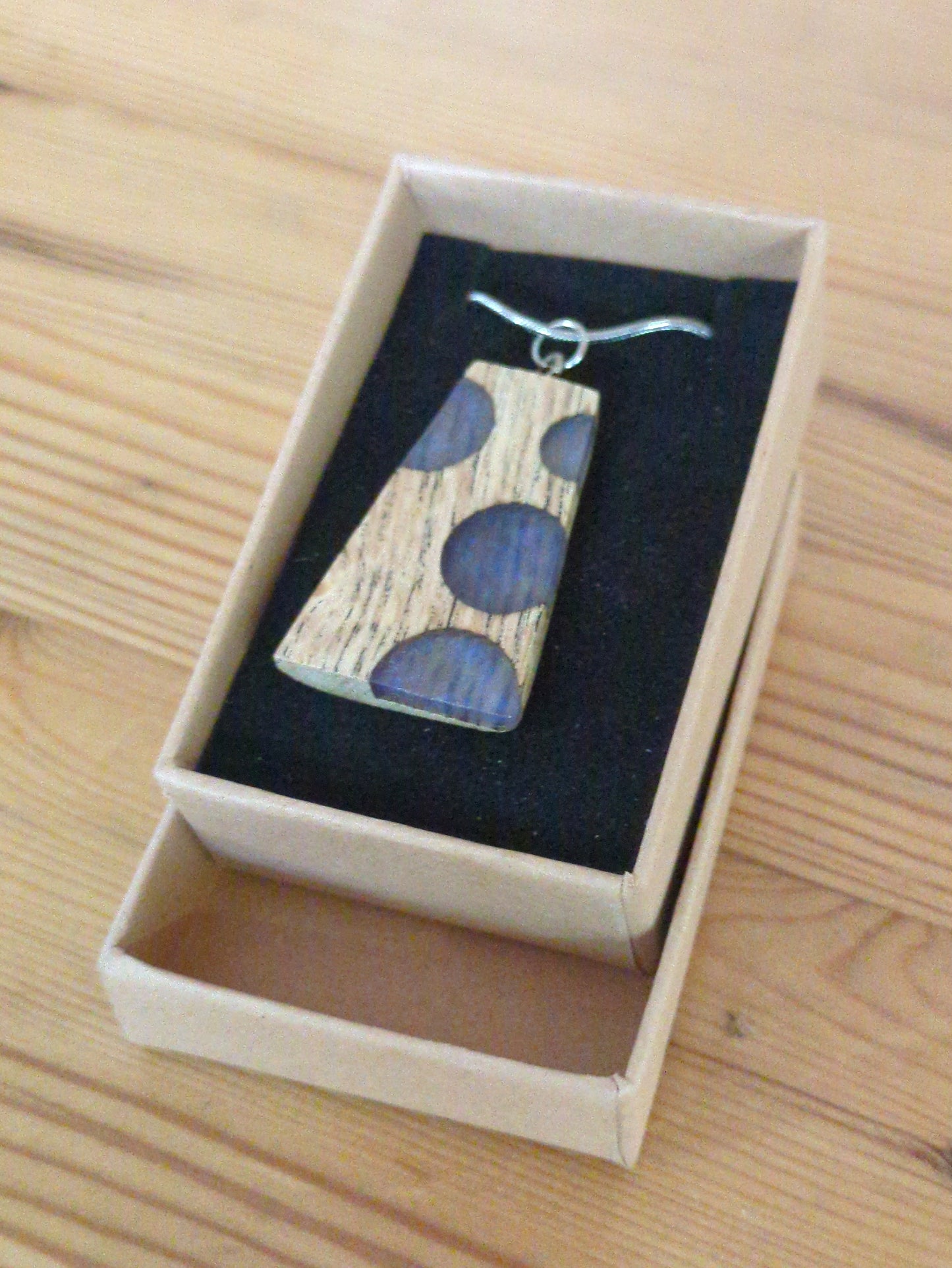 Oak pendant with a creative blue resin